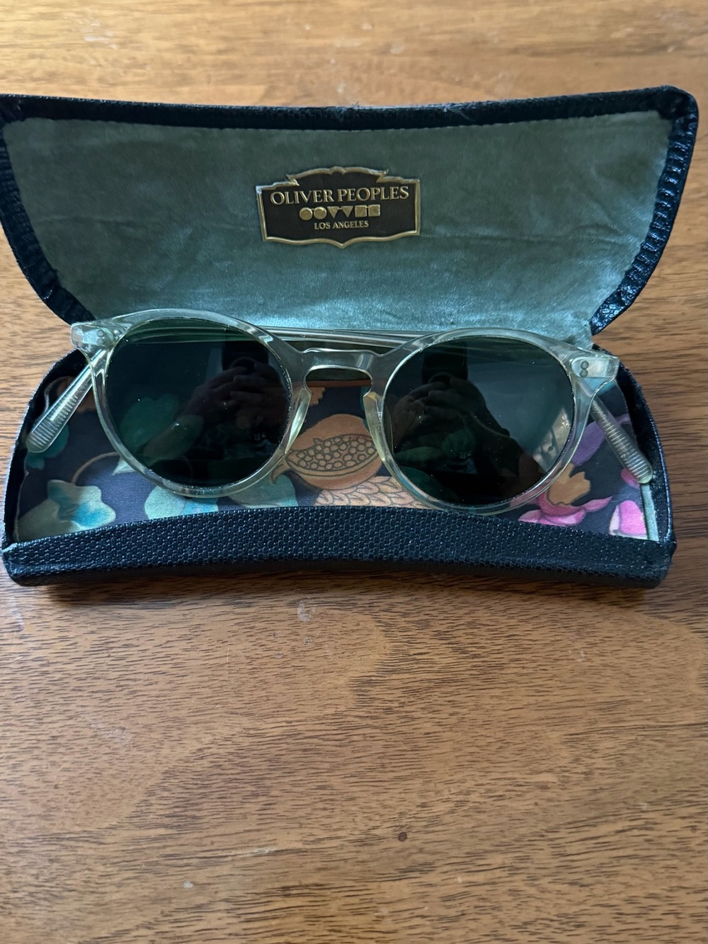 Oliver Peoples O’Malley Clear Frame Sunglasses with Green Lenses